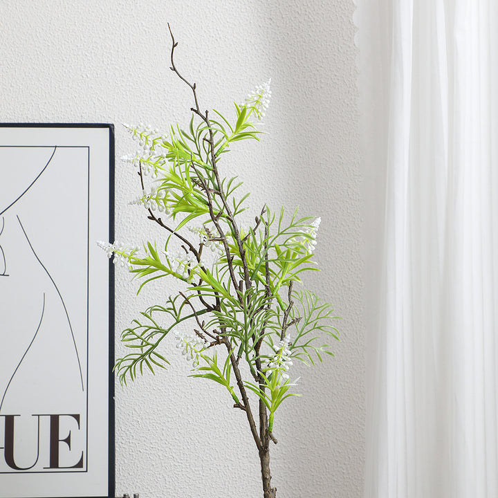 Artificial plant with decorative flowers