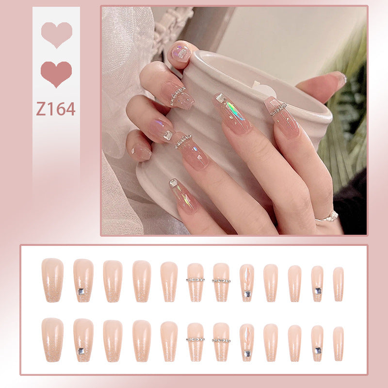 Acrylic nail set with glamorous rhinestone and glitter elements Kalsten