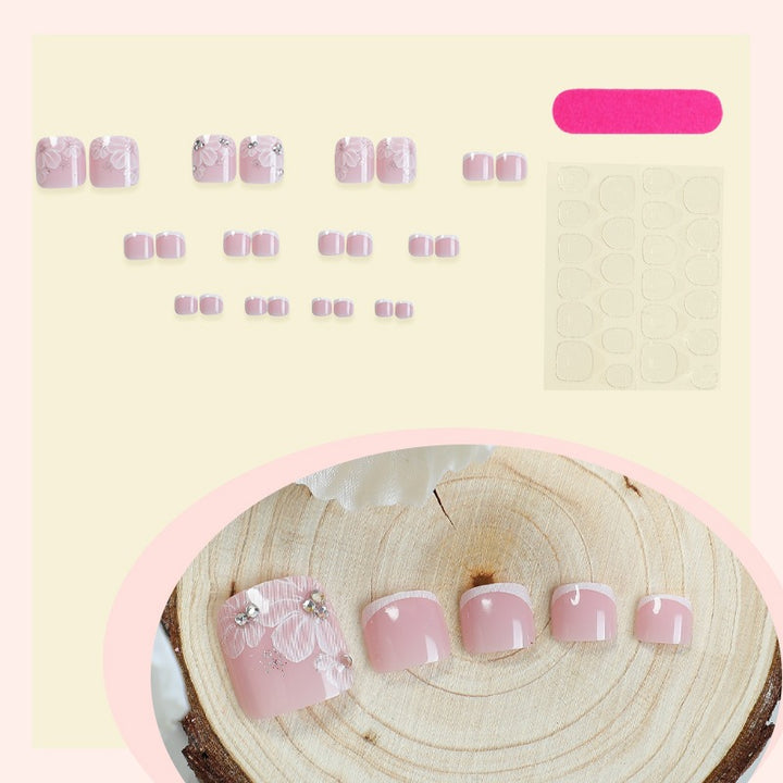 Nail art set with delicate floral design and glitter accents Kalsten