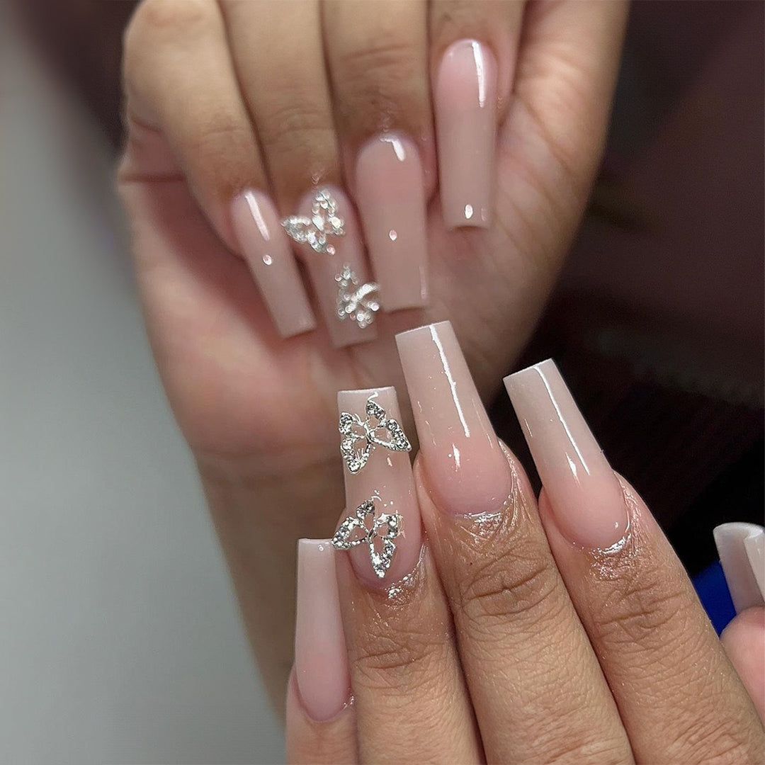 Artificial nails with butterfly accents and rhinestone decorations Kalsten