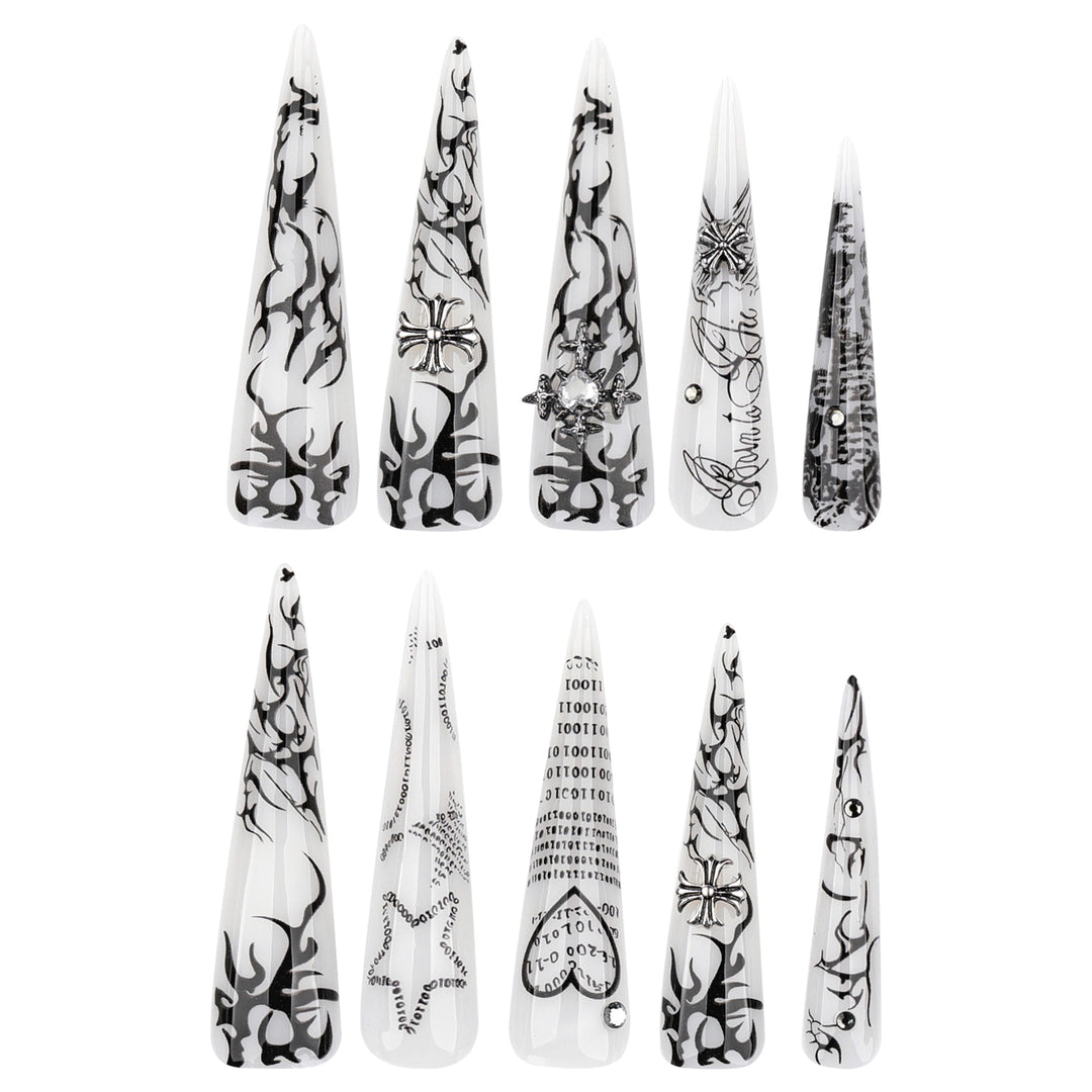 Artful stiletto nails with gothic pattern and embellishments Kalsten
