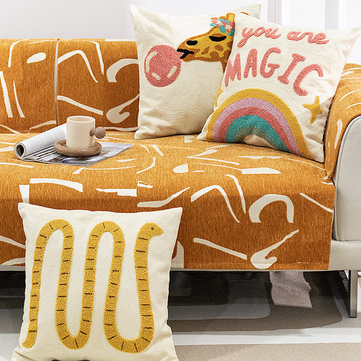 Decorative pillowcase with hand-tufted giraffe and rainbow motif