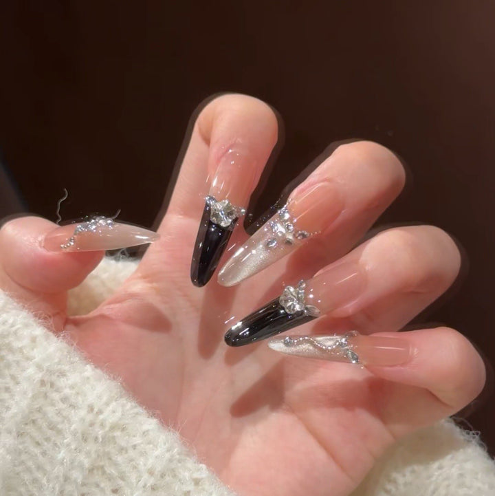 Artistic Stiletto Press-On Nail Art with Glimmering Accents Kalsten