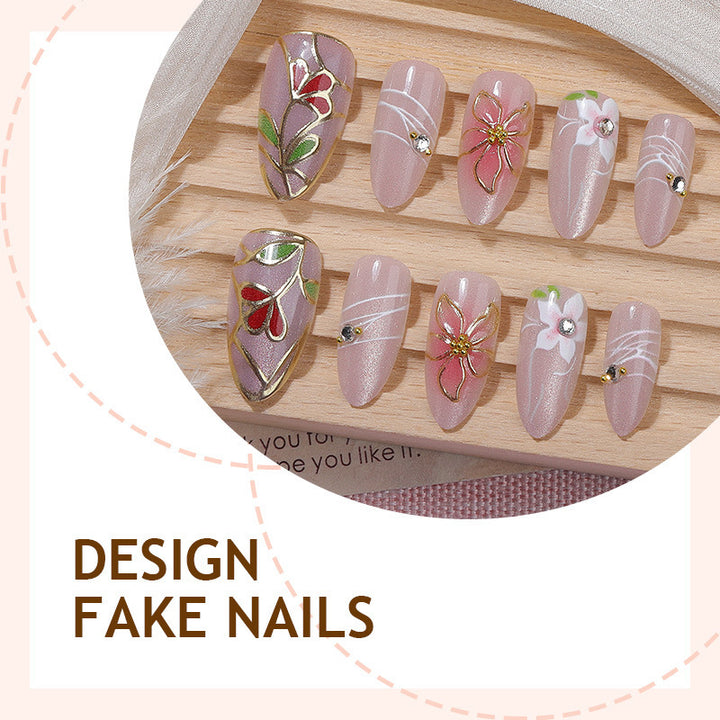 Artificial nail set with luxurious floral designs and glitter accents Kalsten