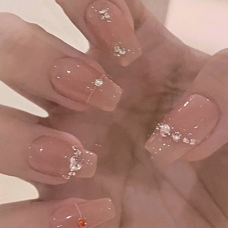 Glamorous nail art with rhinestone embellishment Kalsten
