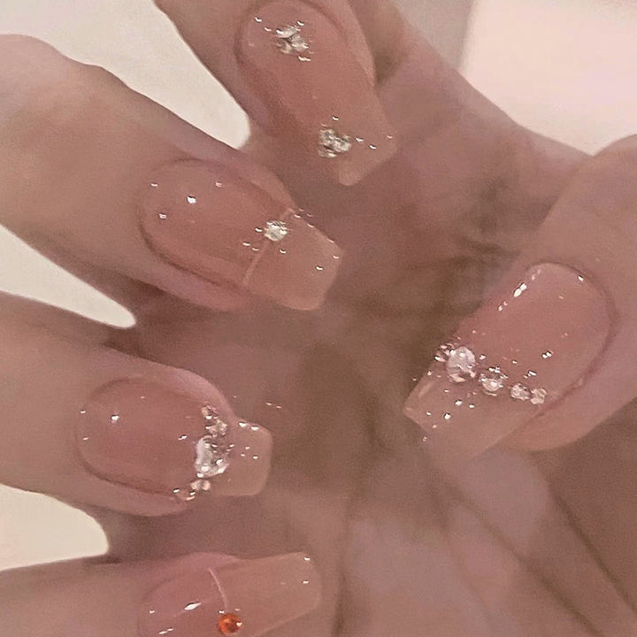 Glamorous nail art with rhinestone embellishment Kalsten