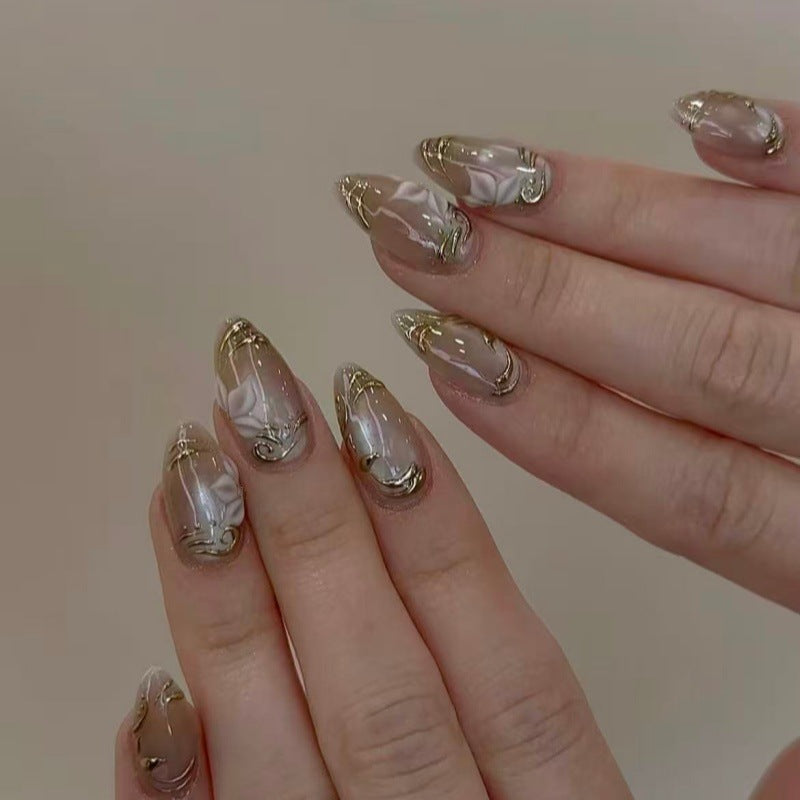 Elegant artificial nails with marble and gold accents Kalsten