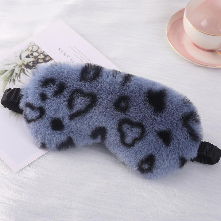 Women's cuddly faux fur sleep mask with heart-embossed surface and gathered comfort band Kalsten