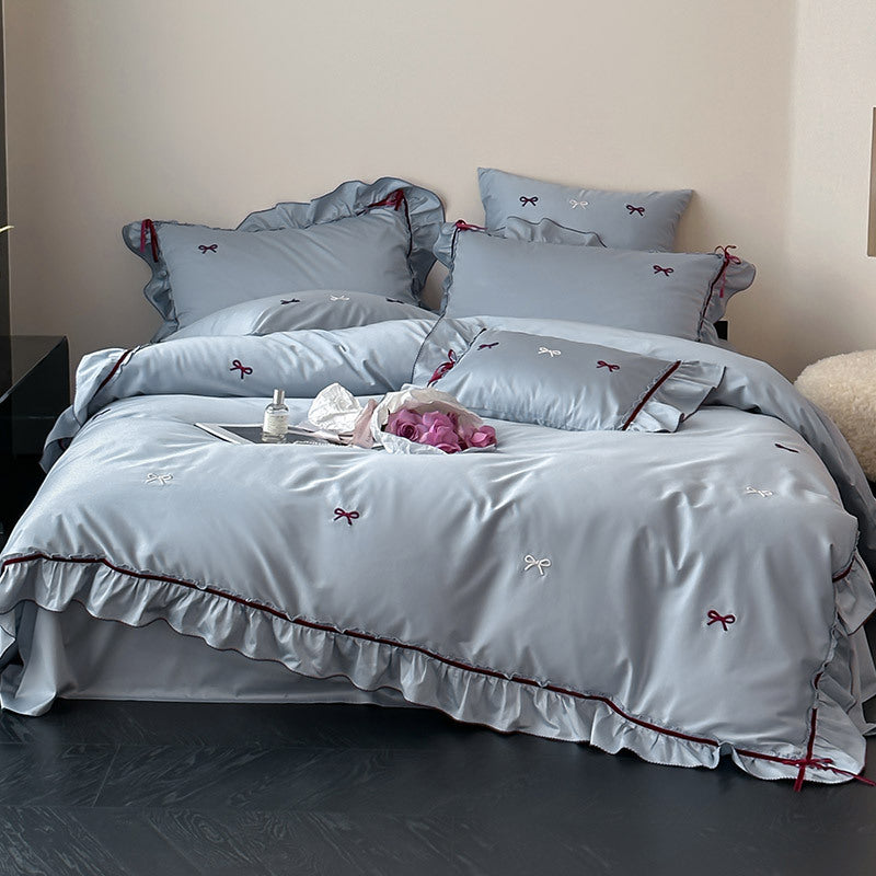 Premium bedding set made of cotton satin with ruffles and bow embroidery
