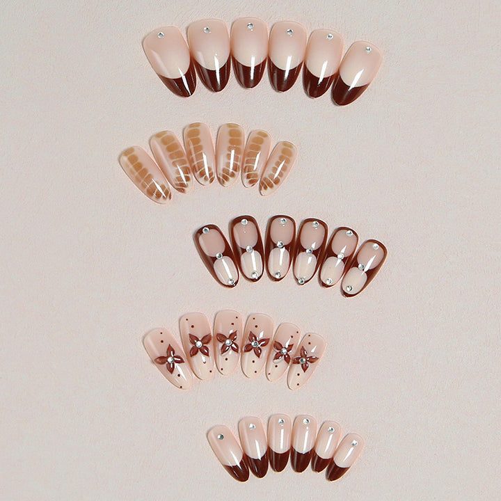 Artificial nails with elegant motif designs Kalsten