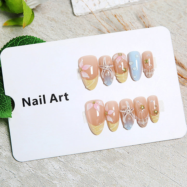 Artificial nails with floral motifs and glitter details Kalsten