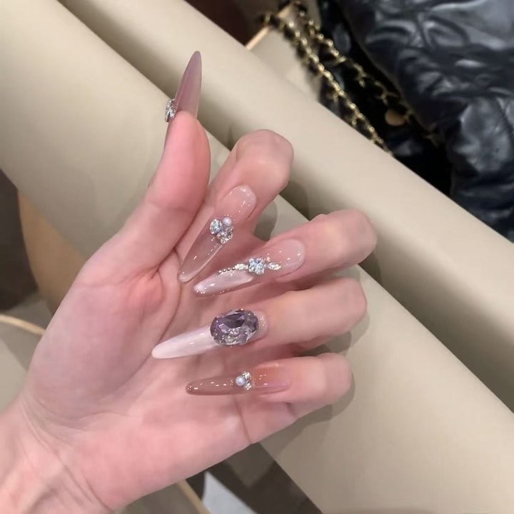 Artistic Stiletto Press-On Nail Art with Glimmering Accents Kalsten