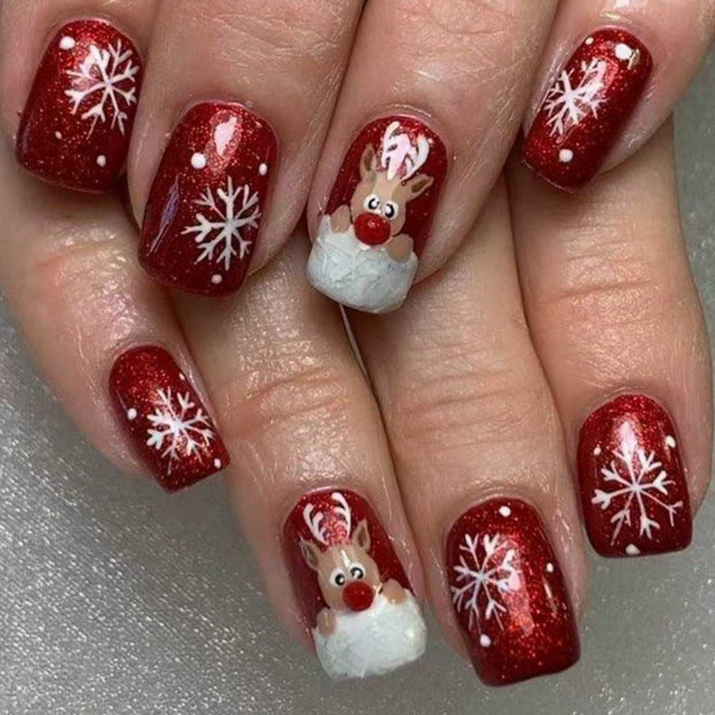 Creative artificial nails with festive reindeer design Kalsten