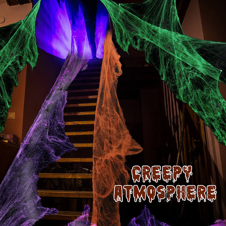 Decorative Halloween spider web with artificial spiders