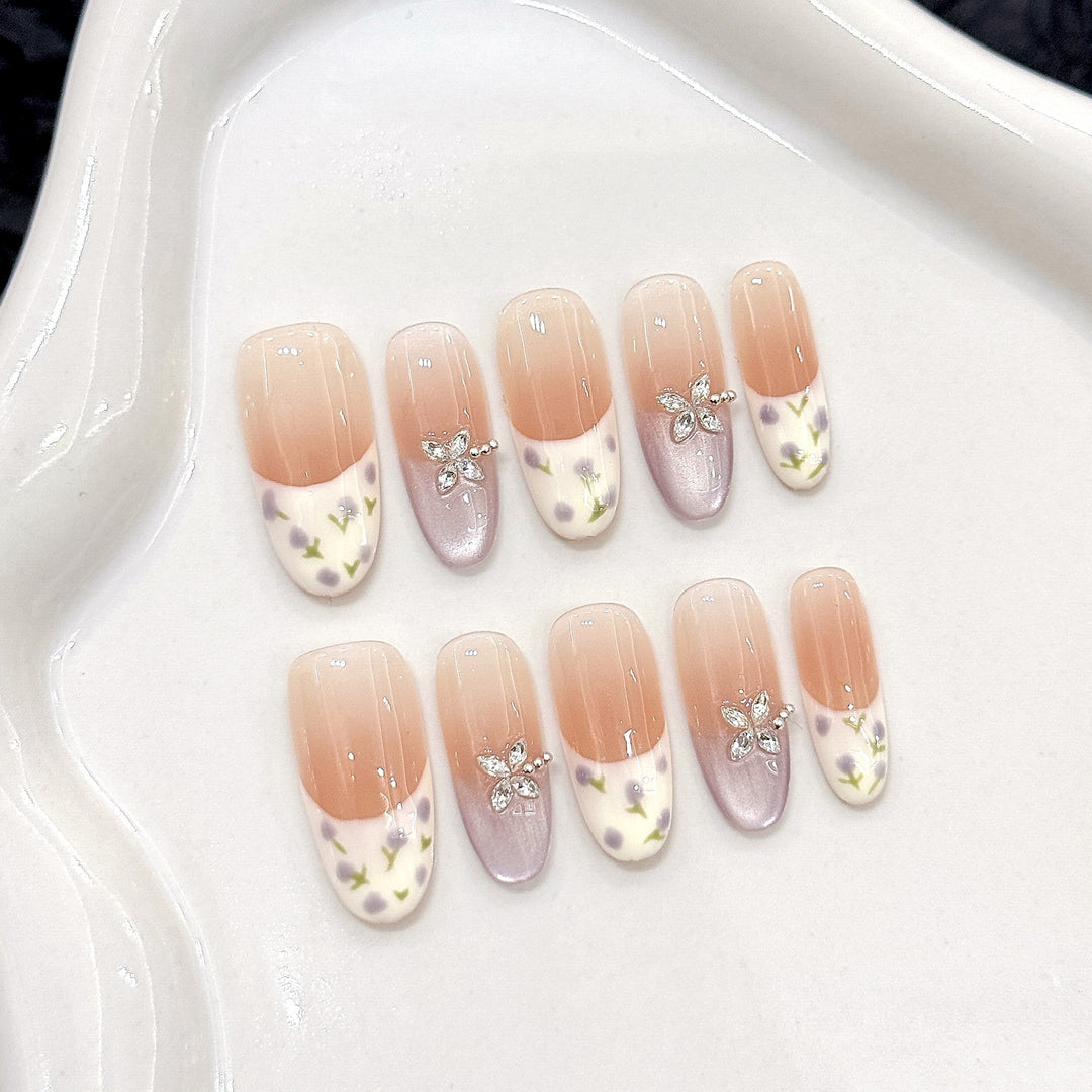 Artistic Press-On Nail Design Set with Floral Embellishments
