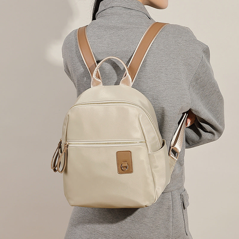 Compact Nylon Backpack with Multiple Pockets