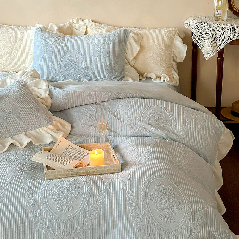 Ruffled quilted bedding set with jacquard medallion and ruffle