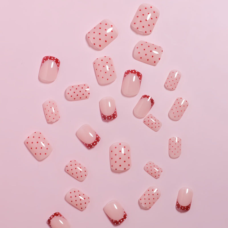 Stylish Press-On Nail Design with Polka Dot and French Tip Accents Kalsten