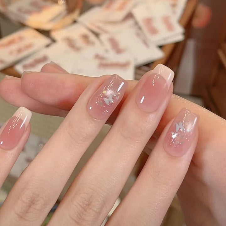 Stylish Press-On Nail Extensions with Artistic Accents