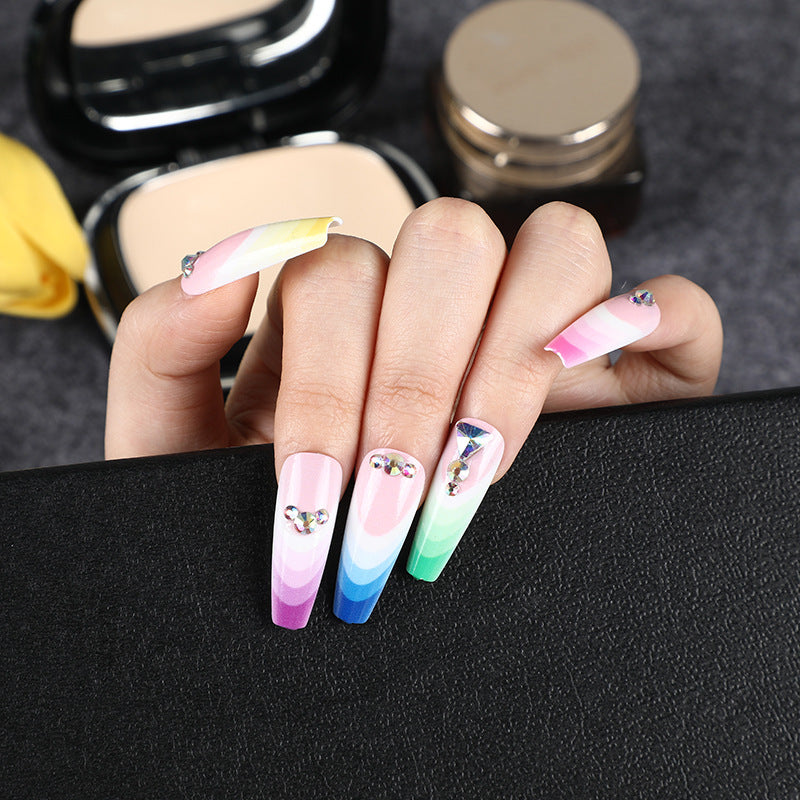 Artificial nails in luxurious ombre design with rhinestone accents Kalsten