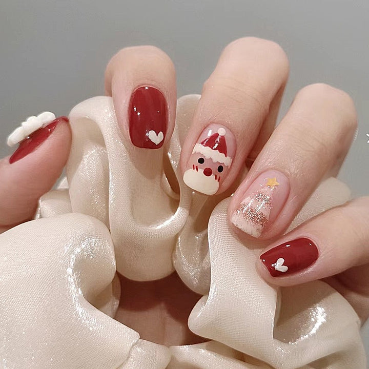 Artificial nail set with festive Christmas motifs and glitter accents Kalsten