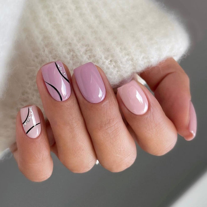 Artistic Nail Design with Glitter Accents Kalsten
