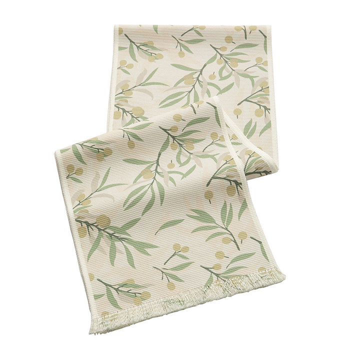 Woven table runner with floral jacquard pattern and fringed edge Kalsten