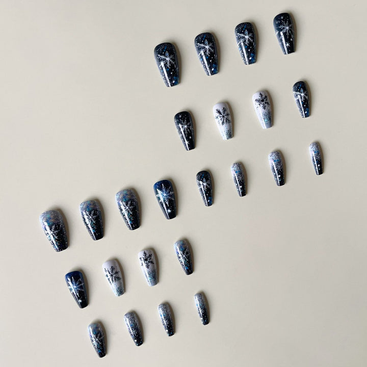 Nail art set with sparkling snowflakes and glitter accents Kalsten