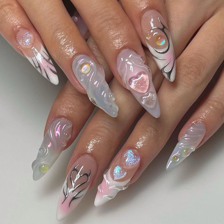 Artful nail extensions with two-dimensional design and glitter accents Kalsten
