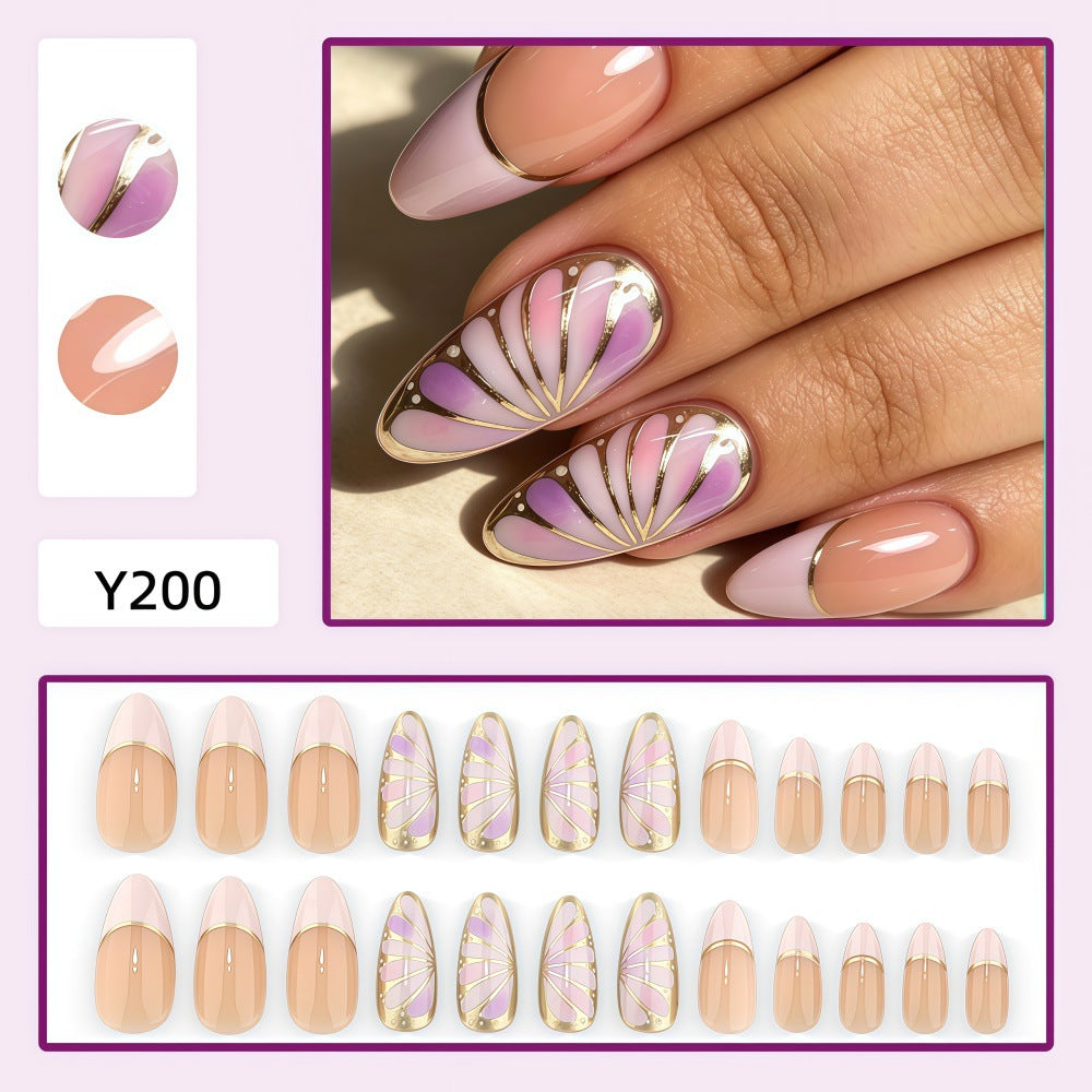 Artificial nails with luxurious gold edge and filigree design Kalsten