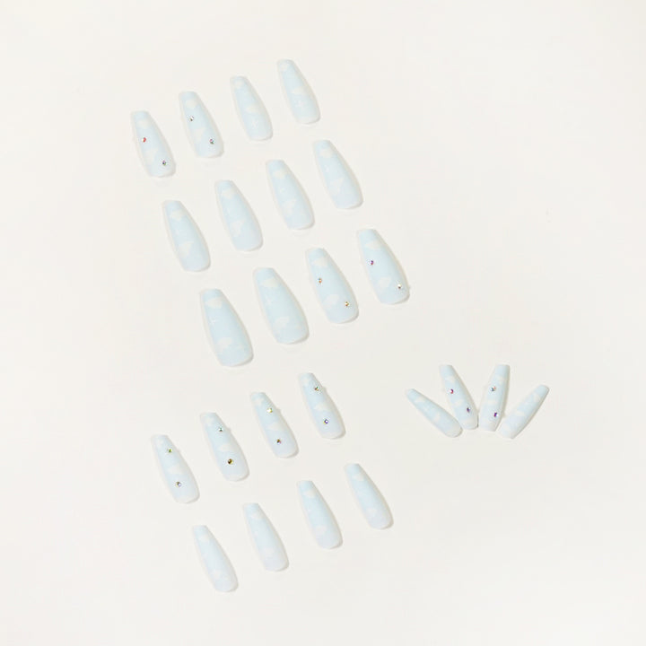 Creative nail art in cloud design with glitter accents Kalsten
