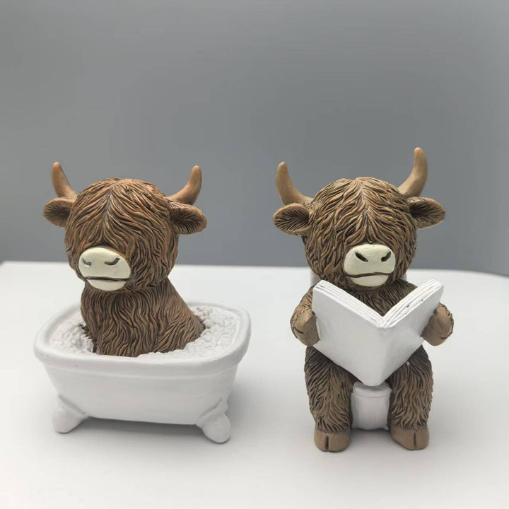 Funny decorative figure of a Highland cow in a bathtub Kalsten
