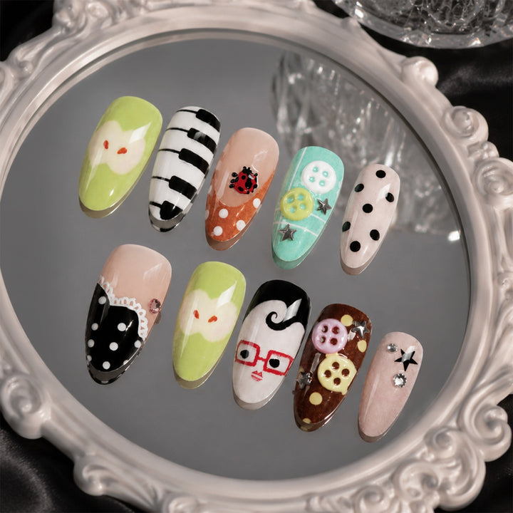 Creative nail art set with playful patterns and 3D details Kalsten