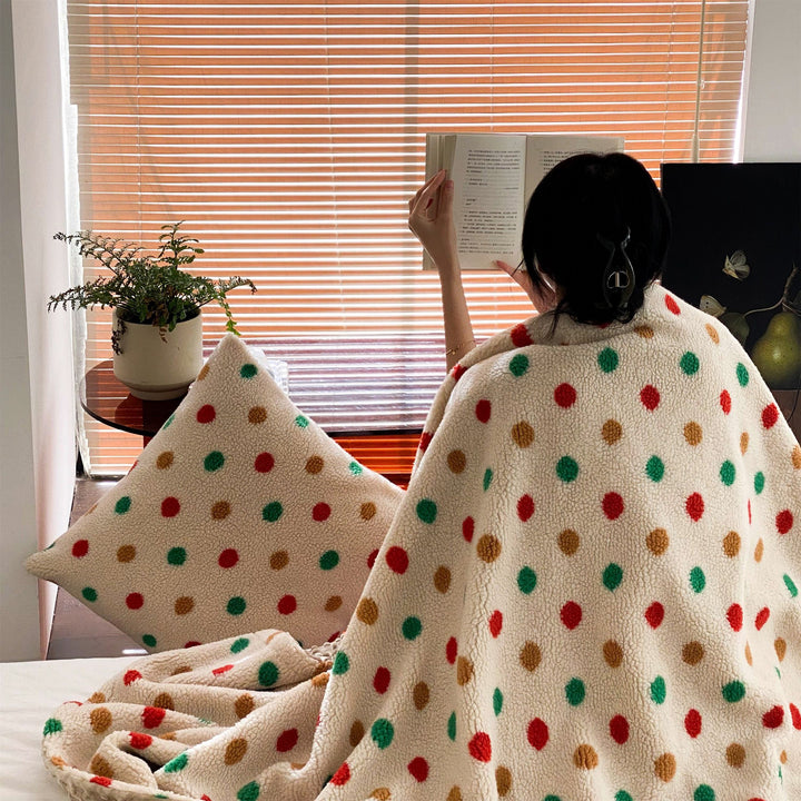 Cozy sherpa throw blanket with colorful dot appliqués and matching cushion cover