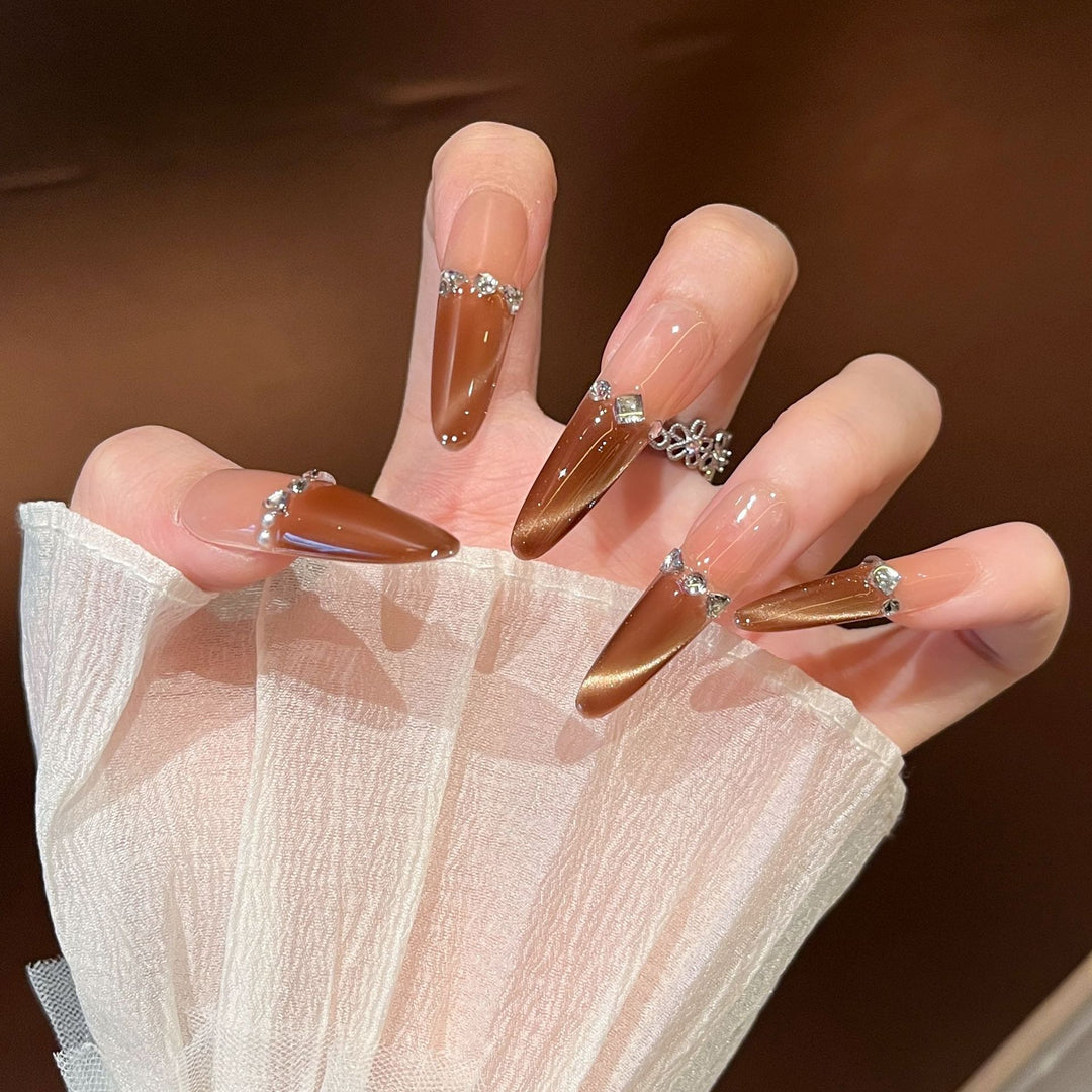 Artistic Stiletto Press-On Nail Art with Glimmering Accents Kalsten