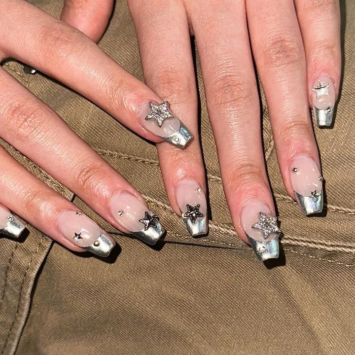 Glamorous acrylic nails with sparkling star design Kalsten