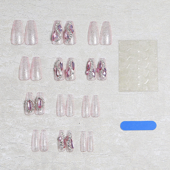 Glamorous artificial nails with sparkling rhinestone decorations Kalsten