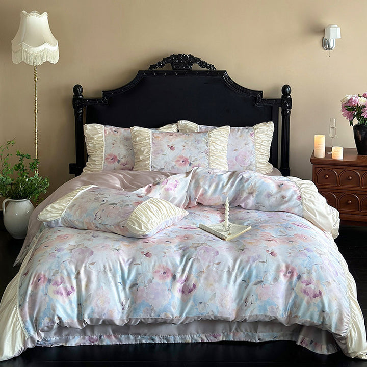 Elegant satin bedding set with watercolor floral pattern, ruffles and gathered pillowcases
