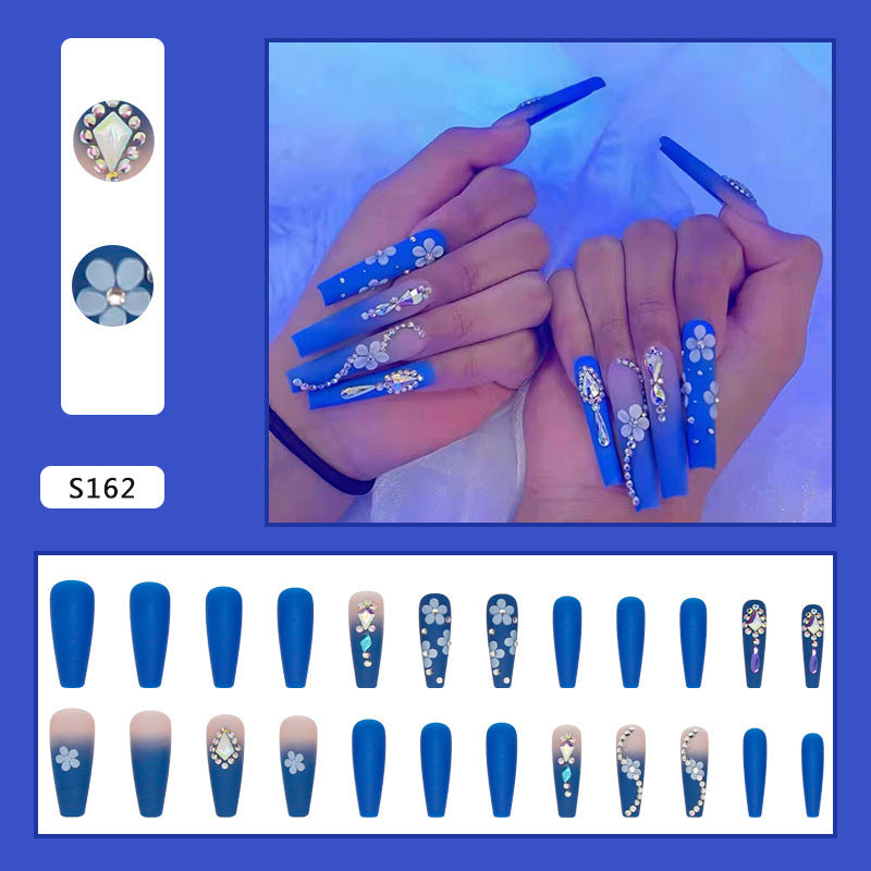 Nail art set with elegant 3D flower designs and glitter accents Kalsten