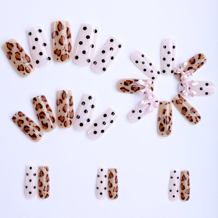 Creative artificial nails with bows and dots Kalsten