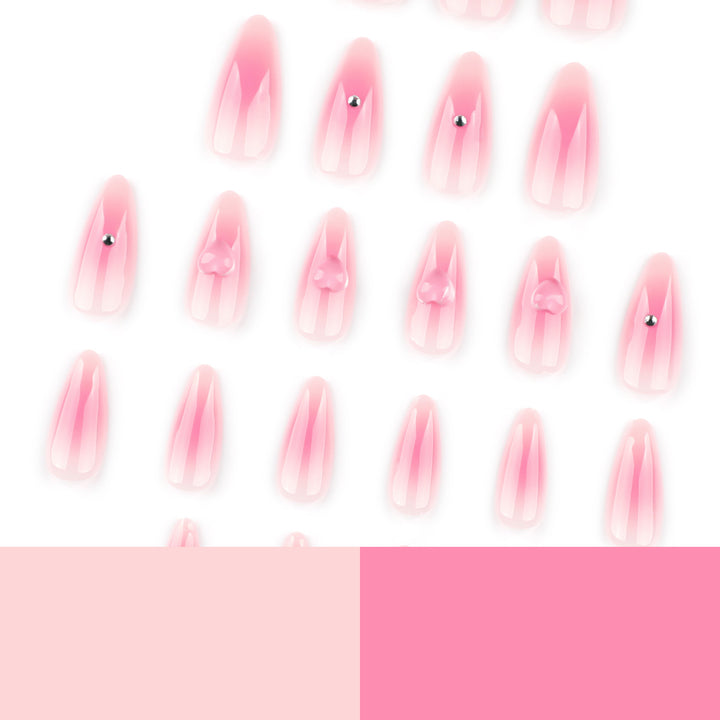 Artful stiletto nails with heart design and glitter accents Kalsten