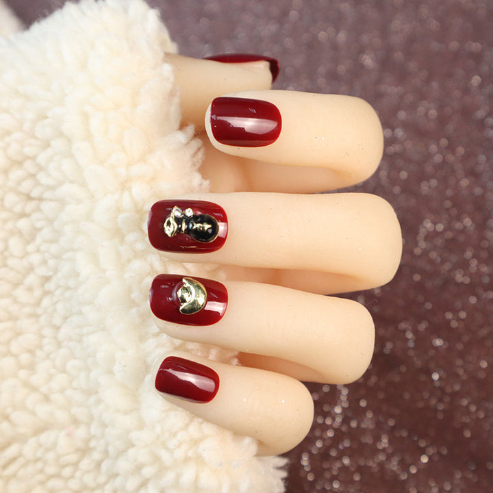 Decorative Press-On Nail Set with Unique Gold Accents
