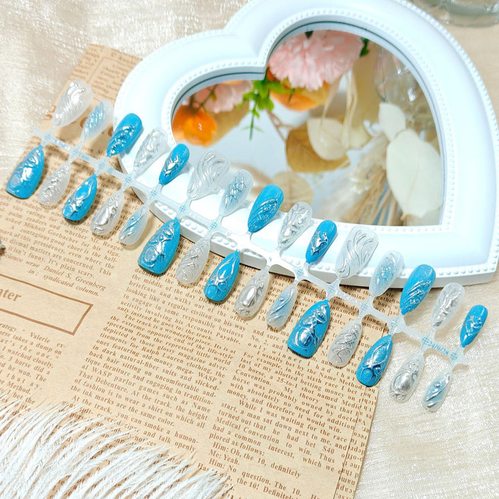 Creative artificial nails with shiny silver and turquoise tones Kalsten