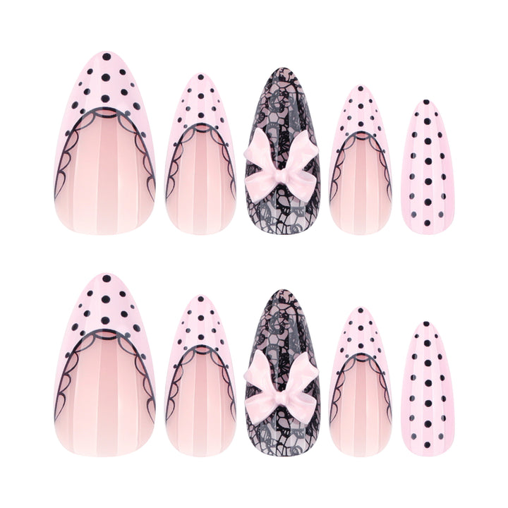 Elegant and artistic stiletto nails with tips and bows Kalsten