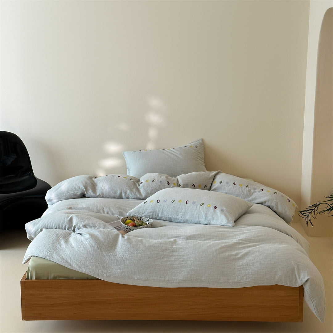 Bedding set in linen look with subtle embroidered border
