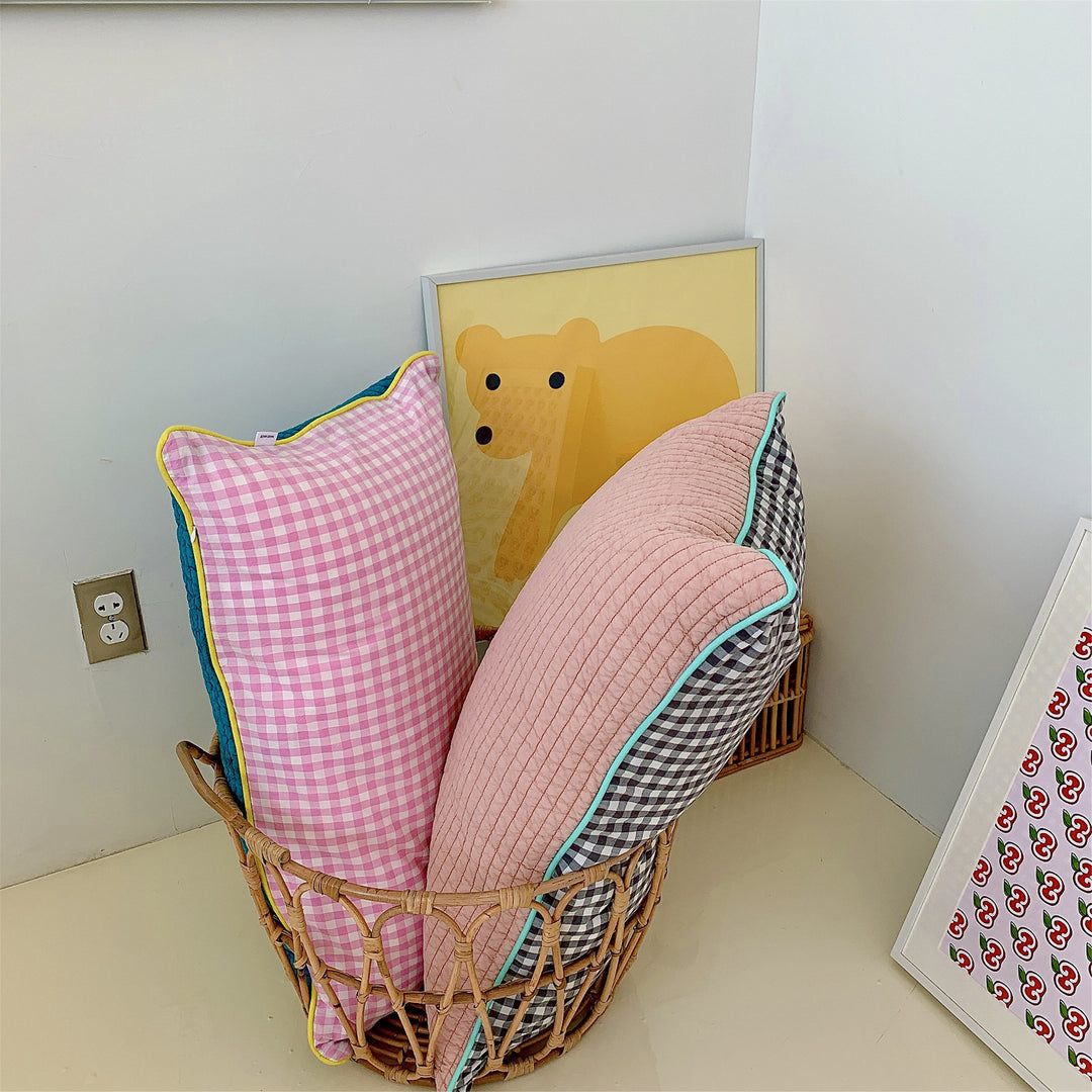 Reversible quilted pillow set with checked cotton cover and contrasting piping