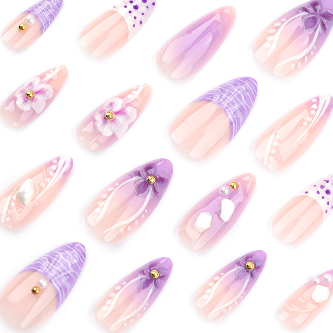 Artful nail extensions with elegant floral embellishments Kalsten