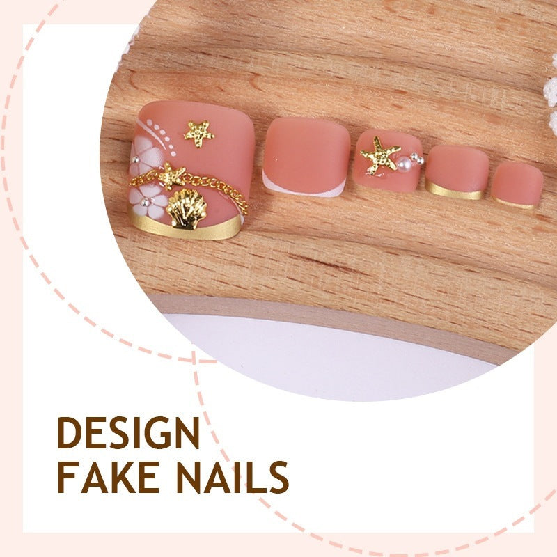 Acrylic nail set with exquisite floral accents and golden embellishments Kalsten