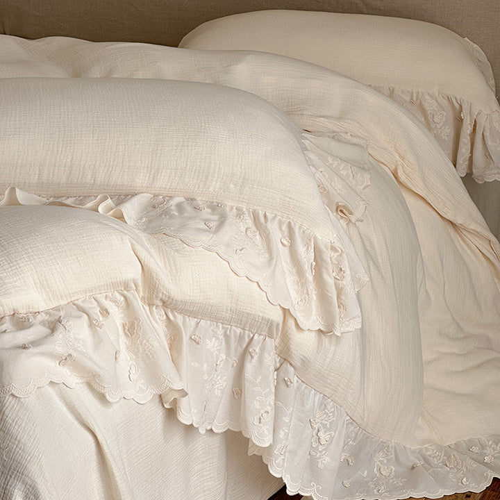 Romantic bedding set made of cotton-linen with embroidered lace, ruffle, and bed skirt