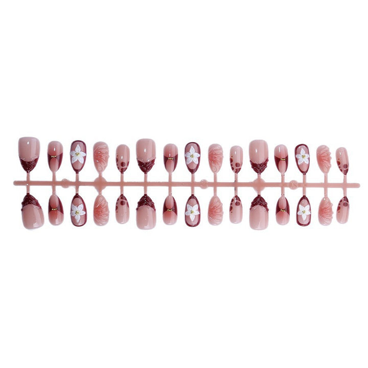 Artificial nail set with floral 3D applications and elegant gradient design Kalsten